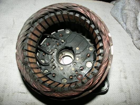 http://teamschock.de/Pictures/Alternator%20Overhaul%20Pictures/14.%20Stator%20mit%20Rueckteil.JPG